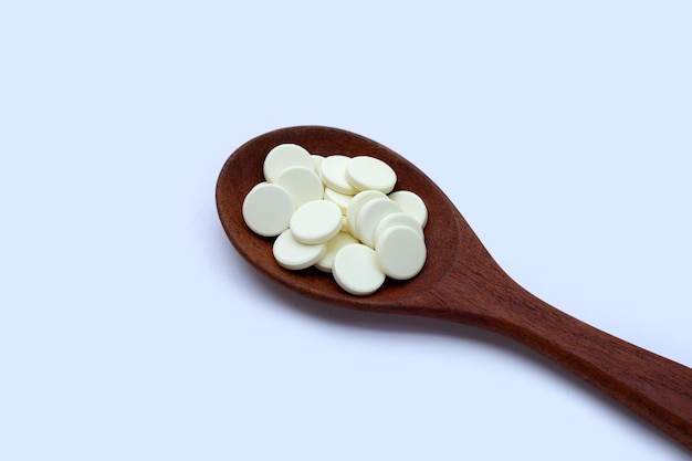 Milk tablet on white background