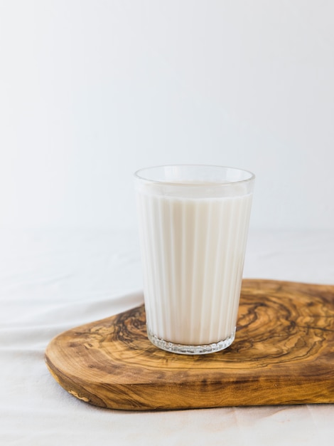 Milk on wooden board