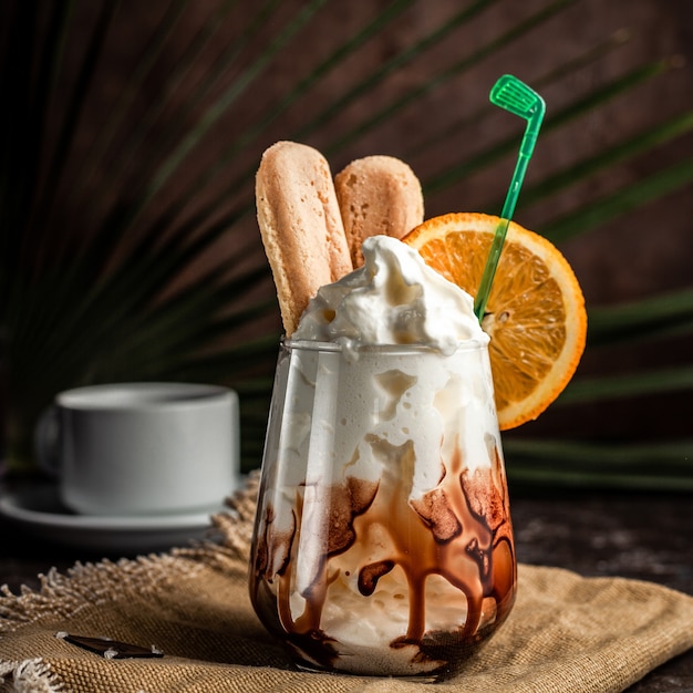 Milkshake cocktail with orange