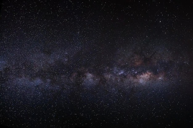 Milky way galaxy with stars and space dust in the universe Long exposure photograph with grain