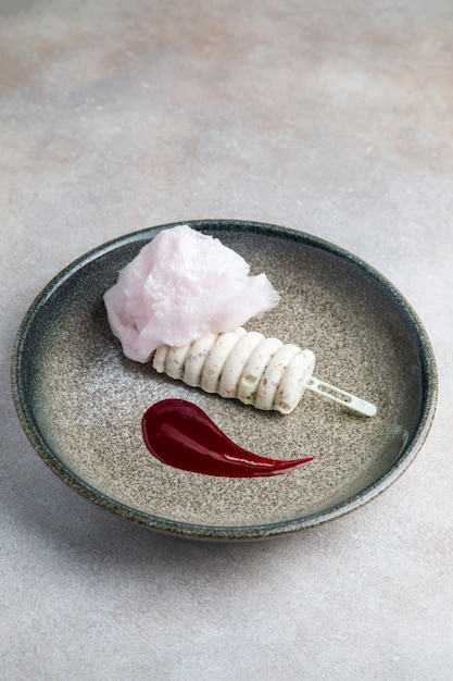 Millefeuille food on a white plate wiht millefeuille isolated\
on white and grey background