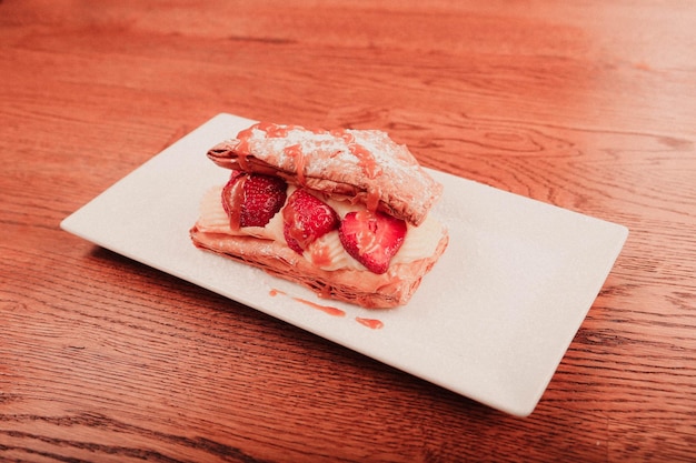 Millefeuille of puff pastry with raspberries strawberries