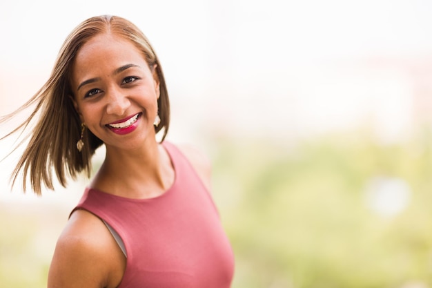 Millennial indian mixed race woman with fashionable hairstyle