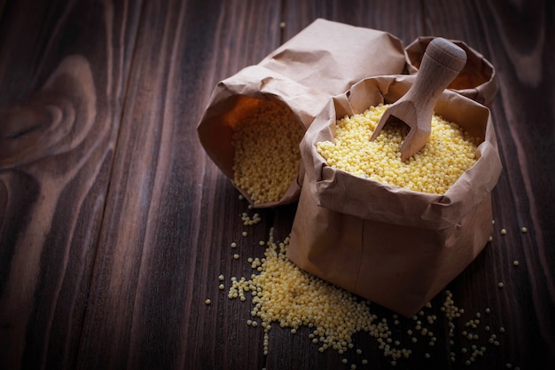 Millet grain in paper bags