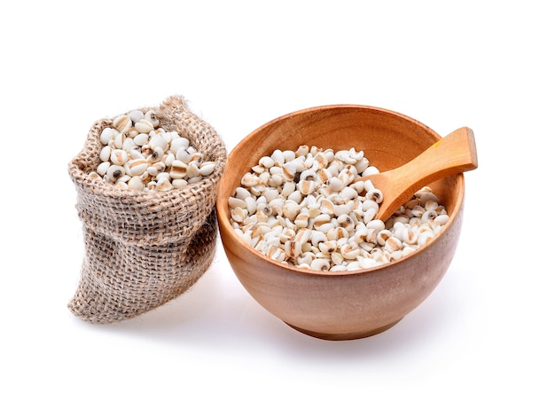 Millet grains on white background