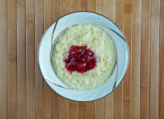 Millet porridge with raspberry jam. close up