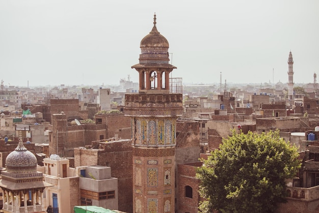 Minaret of the Wazir Khan Mosque (Masjid) in Lahore historical center, Punjab, Pakistan