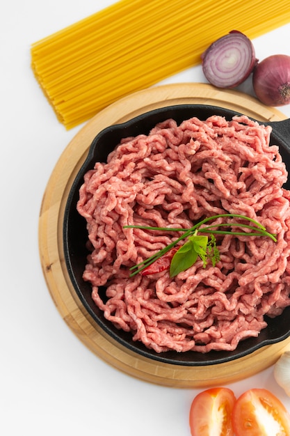 Photo minced beef red uncooked meat cooking ingredient hamburger steak on white background