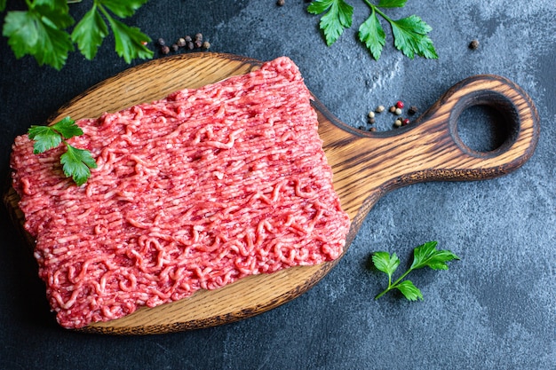 Minced meat ground pork or beef, chicken or turkey fresh ingredient cooking