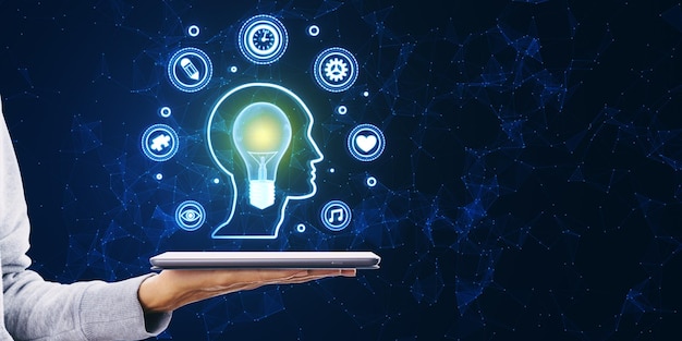 mind mapping and creative inspiration concept close up of female hand holding smartphone with glowing head outline and digital lamp and polygonal icons on blurry blue background with mock up place