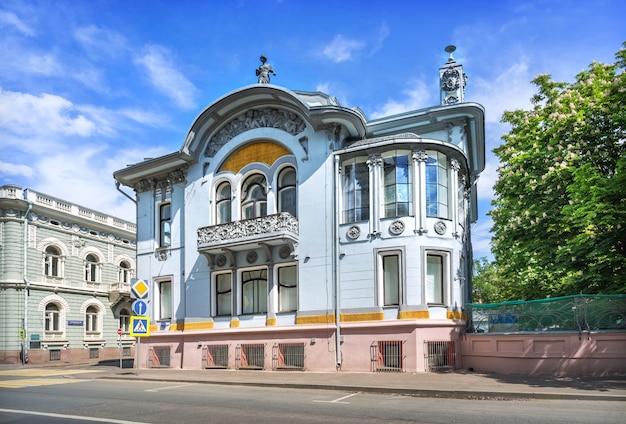 Mindovsky's mansion on Povarskaya street in Moscow on a summer sunny day. Caption: Skaryatinsky lane