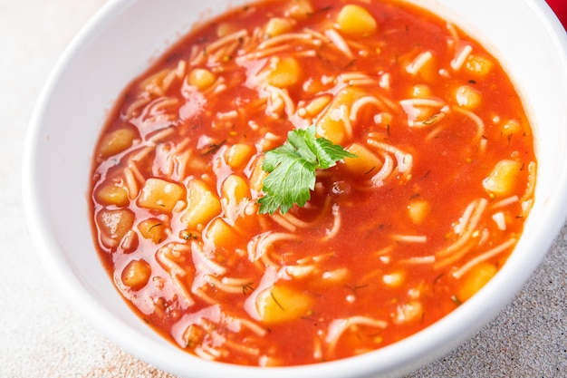 Minestrone red tomato soup first dish meal snack on the table copy space food