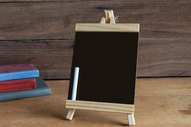 Mini blackboard on standing with white chalk