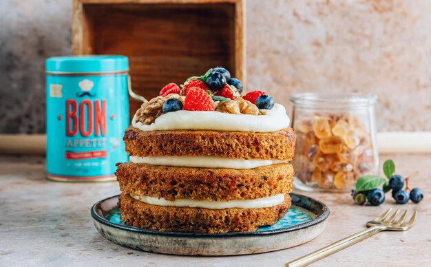 Mini carrot cake with berries and nuts