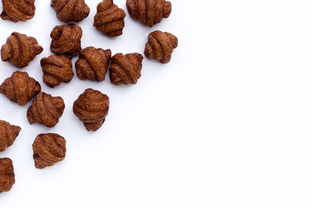 Mini chocolate croissant on white background.