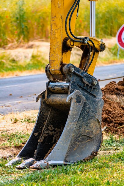 Photo mini digger and bucket exterior works