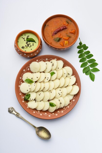 Mini idli is the smaller version of soft and spongy round shaped steamed regular rice idli also known as button and cocktail idly