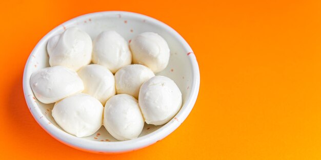 Mini mozzarella cow or buffalo milk fresh portion dietary healthy meal food diet still life snack