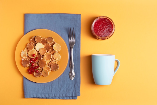 Mini pancakes with berry jam