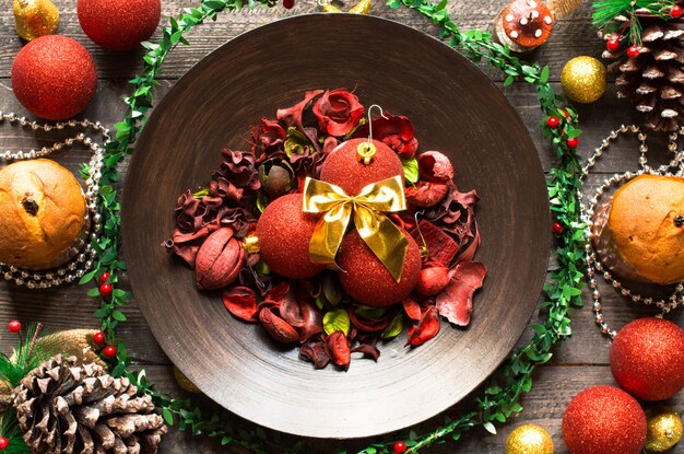 Mini panettone with fruits and Christmas decoration,