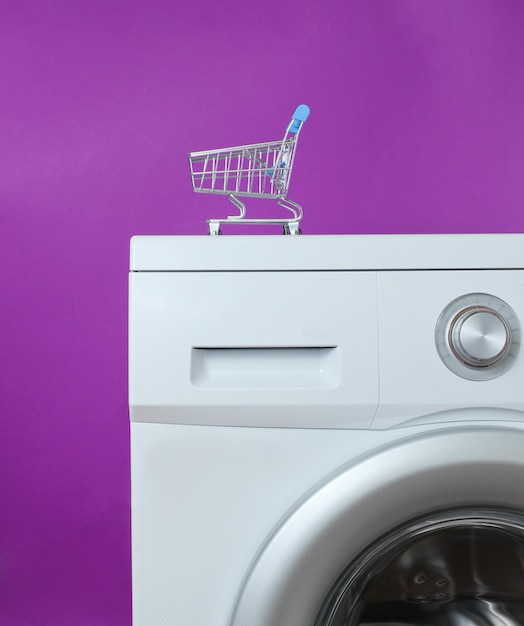 Mini shopping cart on washing machine