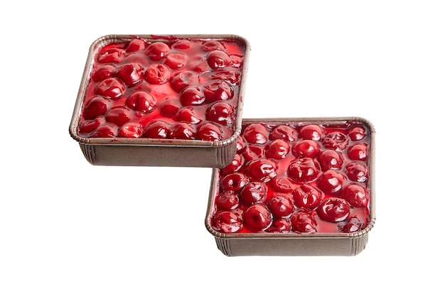 Mini viennese cherry pies in paper tray isolated on white Biscuit cake with cherries sweet dessert