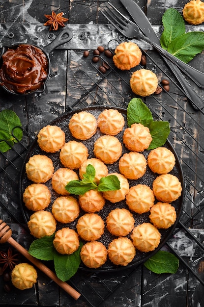 Mini zandkoekkoekjes voor koffie Bovenaanzicht gratis kopieerruimte