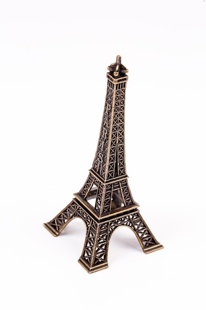 Miniatur Eiffel Tower Paris isolated. Travel concept photo.