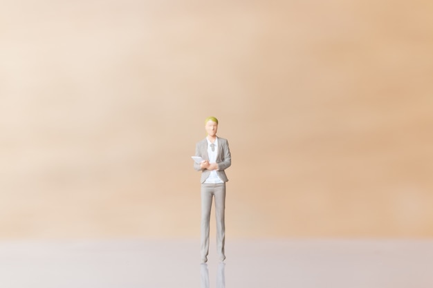 Miniature Business people standing and copy space for text