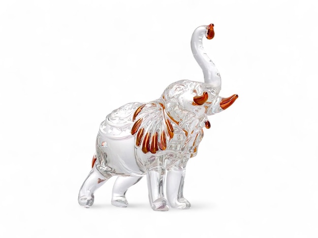 Miniature elephant statue made of glass on a white background