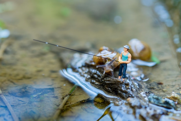 Figura in miniatura pescatore