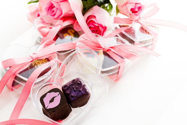 Miniature hear shaped boxes filled with gourmet truffles.