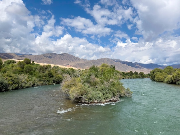 A miniature island in a river in Kyrgyzstan