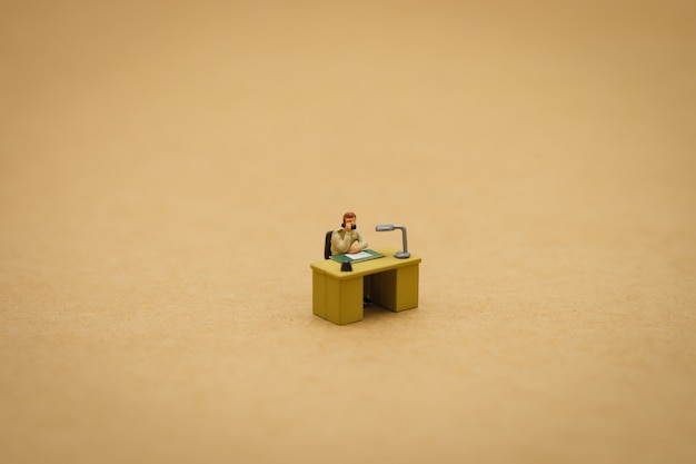 Miniature people businessmen Interview candidates To consider working 