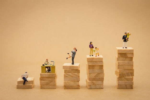 Miniature people  businessmen standing Investment Analysis Or investment. 