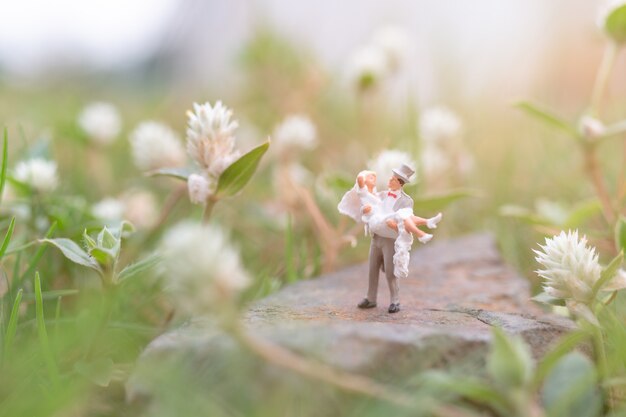 Miniature people: Couple in The garden 