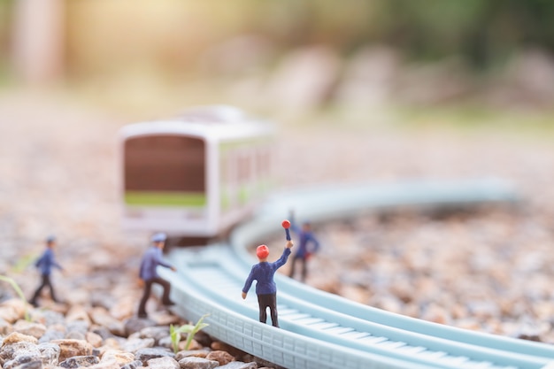 Miniature people: Railway staff are working at railway