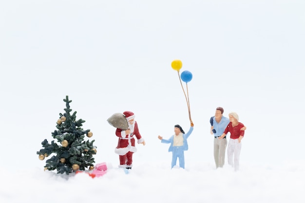 Miniature people, Santa Claus, and gifts for kids