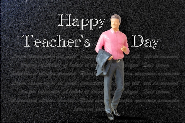 Miniature people Teacher in front of blackboard ,World Teacher Day concept