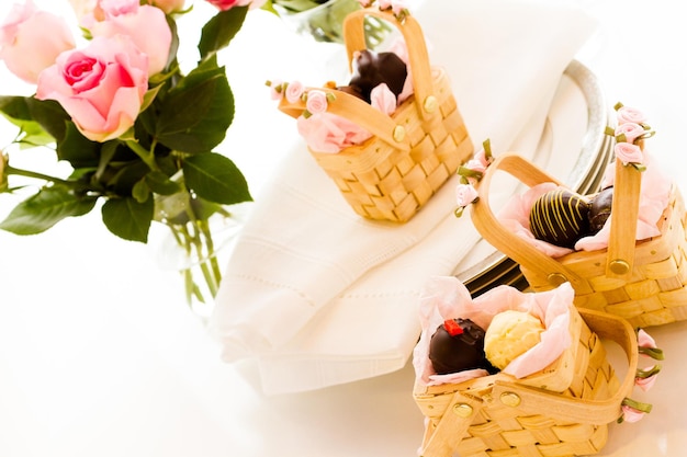 Miniature picnic baskets favor boxes filled with truffles.