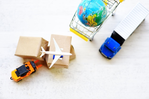 Miniature truck and airplane with boxes