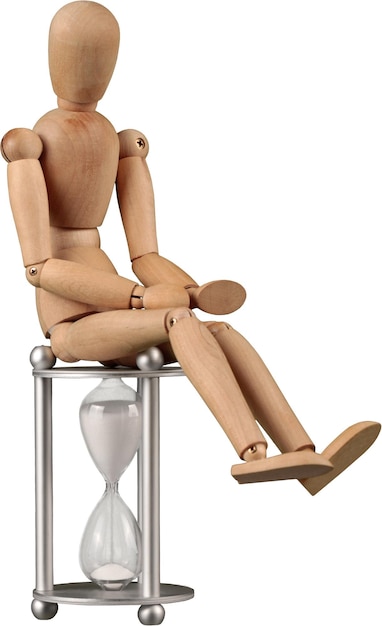 Miniature wooden mannequin sitting on an hourglass