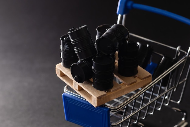 Miniatures toy barrels on a shopping cart