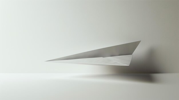 Photo a minimal 3d rendering of a white paper plane on a white background the paper plane is in the center of the image and is facing the left