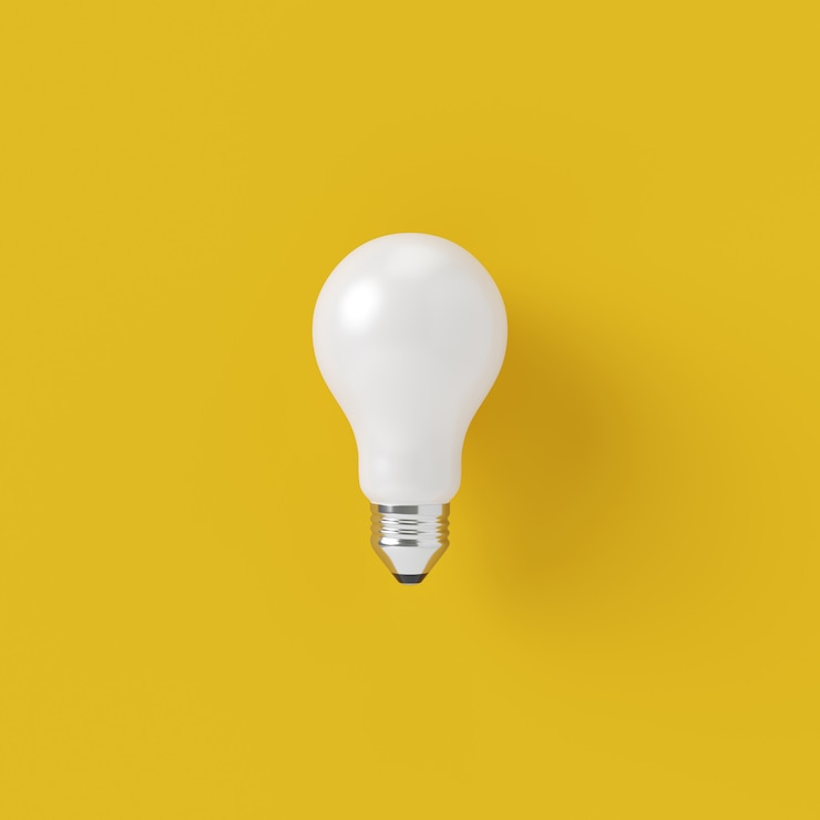 Photo minimal concept. outstanding white light bulb on yellow background