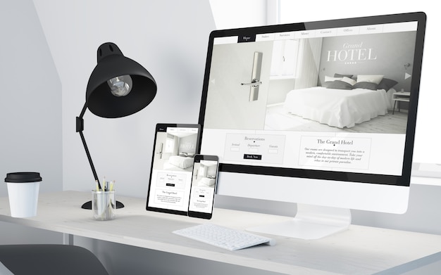 Minimal desktop with responsive hotel website on devices 3d rendering