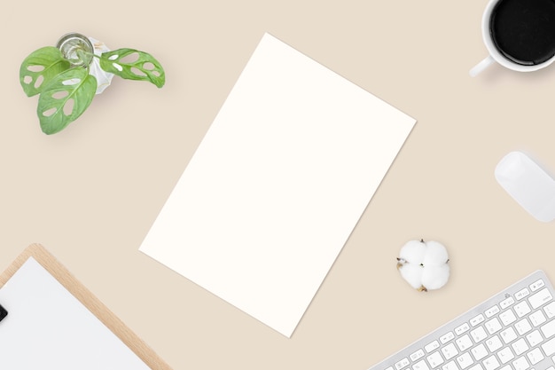 minimal office desk table top view with office supply and coffee cup on a table with copy space, workplace composition, flat lay