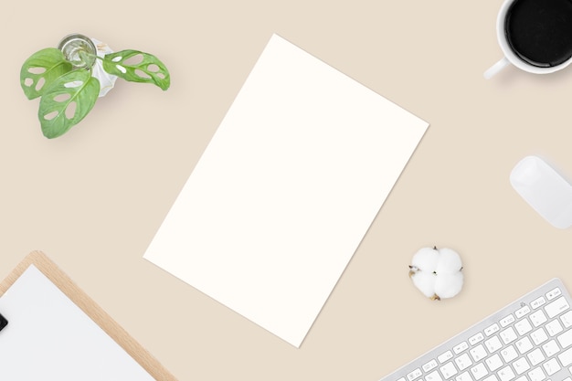 Photo minimal office desk table top view with office supply and coffee cup on a table with copy space, workplace composition, flat lay