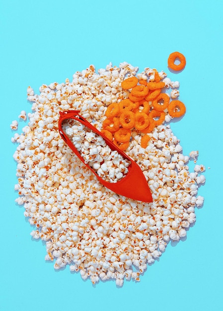Minimal popcorn corn rings background and fashion lady shoes Still life vertical design