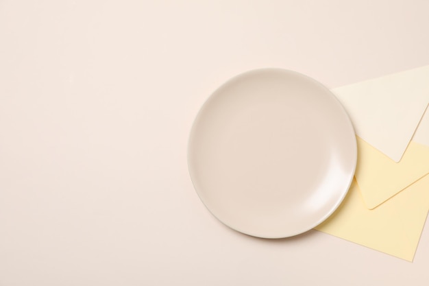 Minimal table setting with blank dish space for text